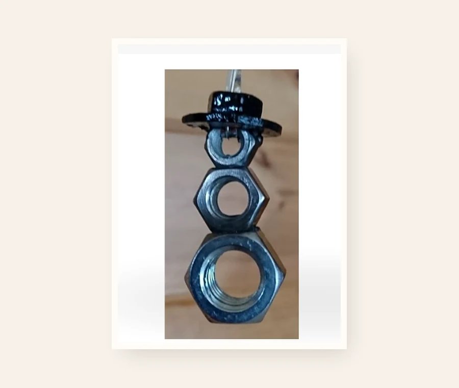 Nutty Snowman, handmade welded horseshoe art by Addison at Rusty Spur Ranch in Arizona